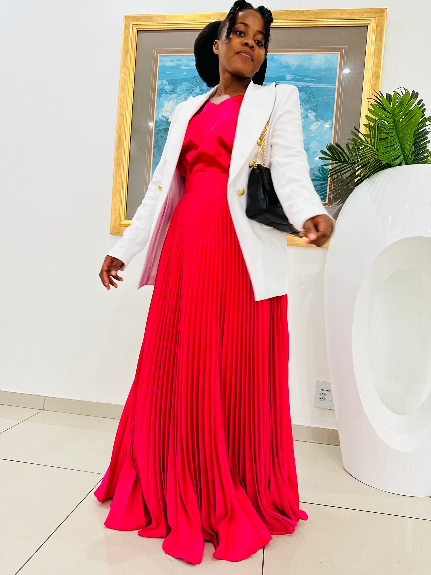 Pleated skirt with a blazer