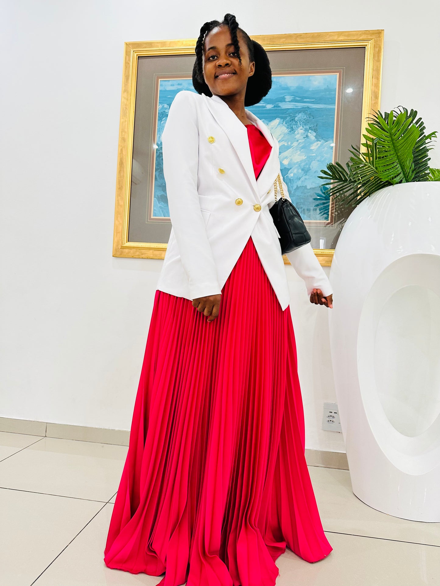 Pleated skirt with a blazer
