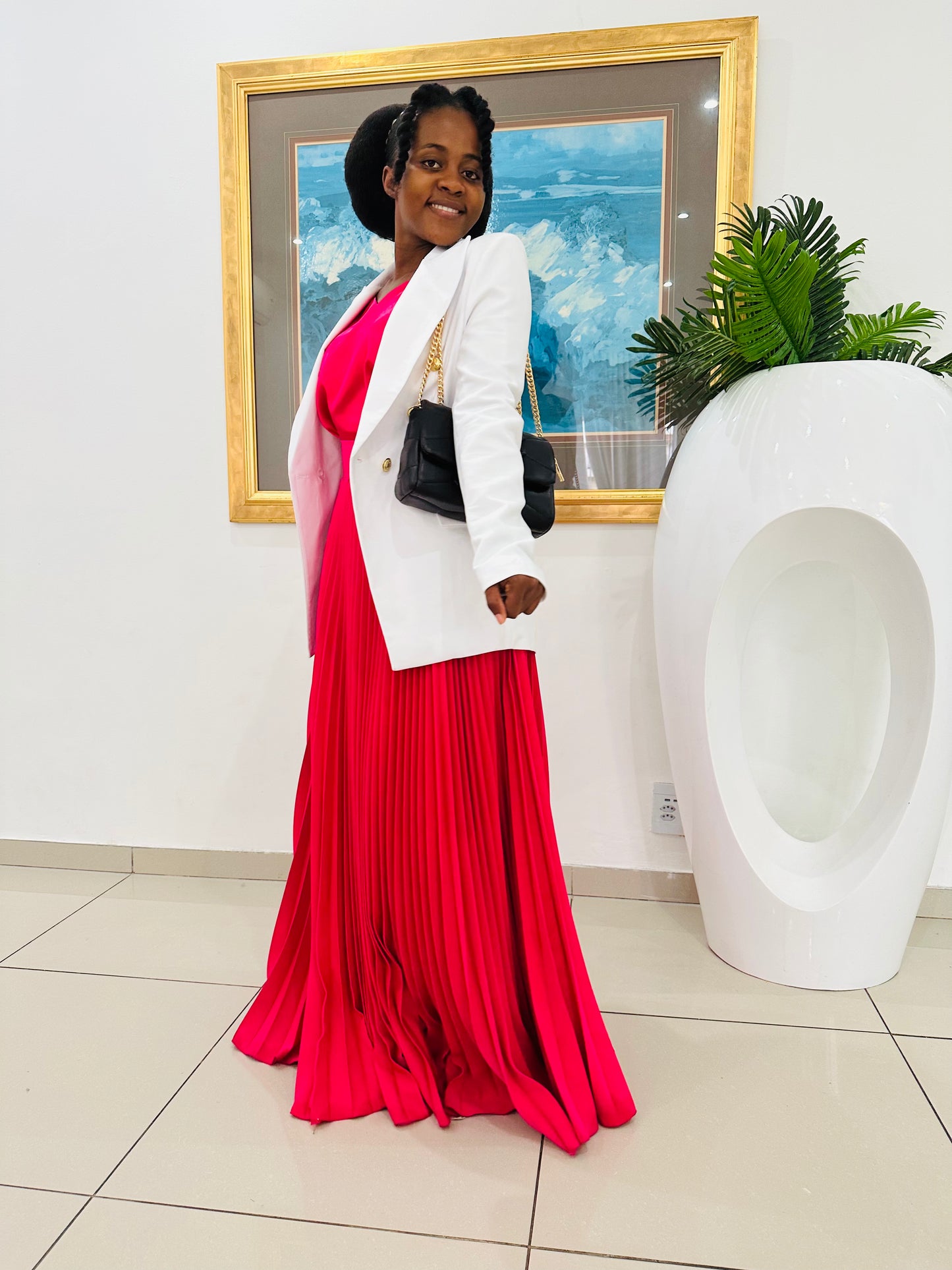 Pleated skirt with a blazer