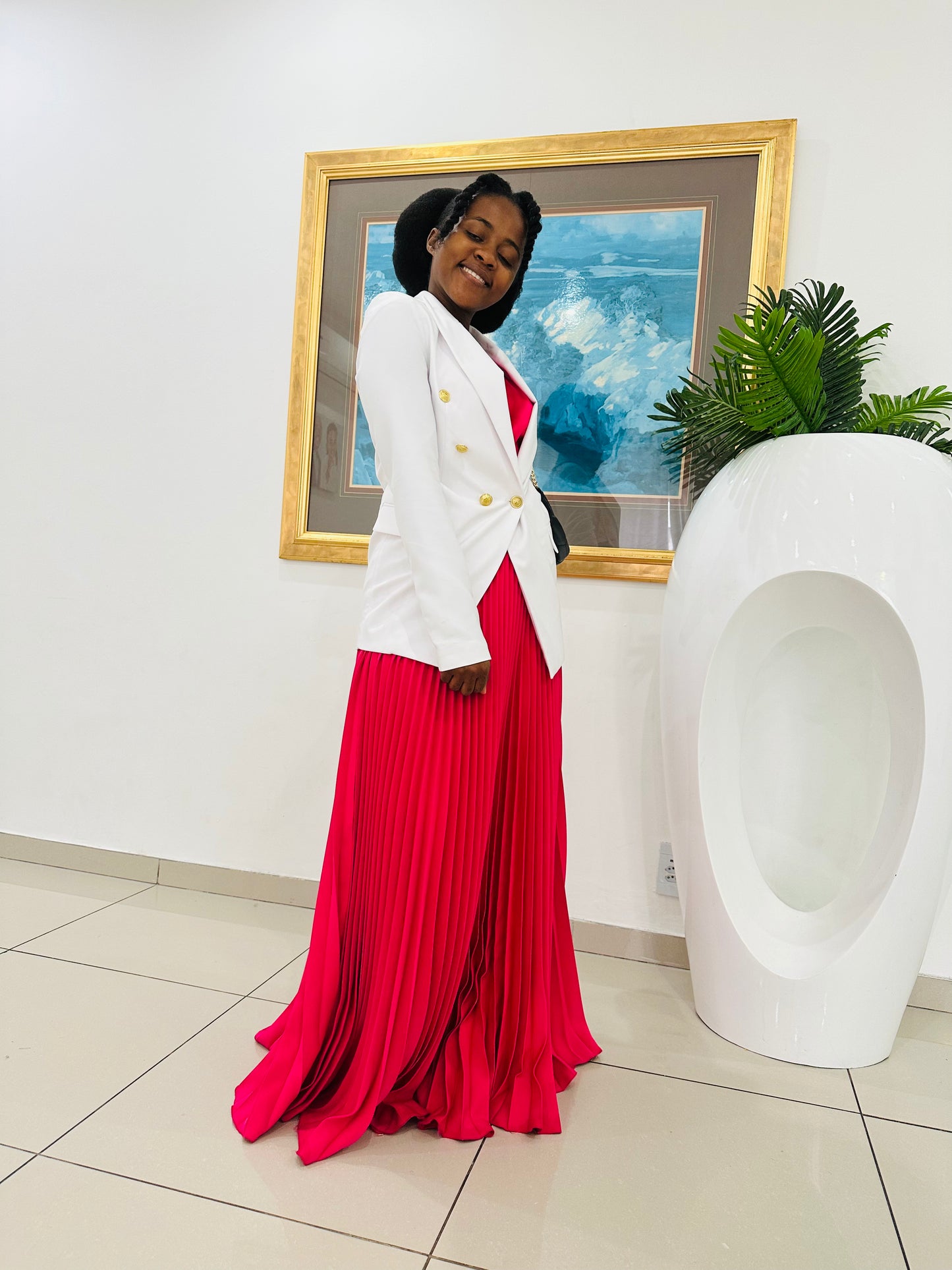 Pleated skirt with a blazer